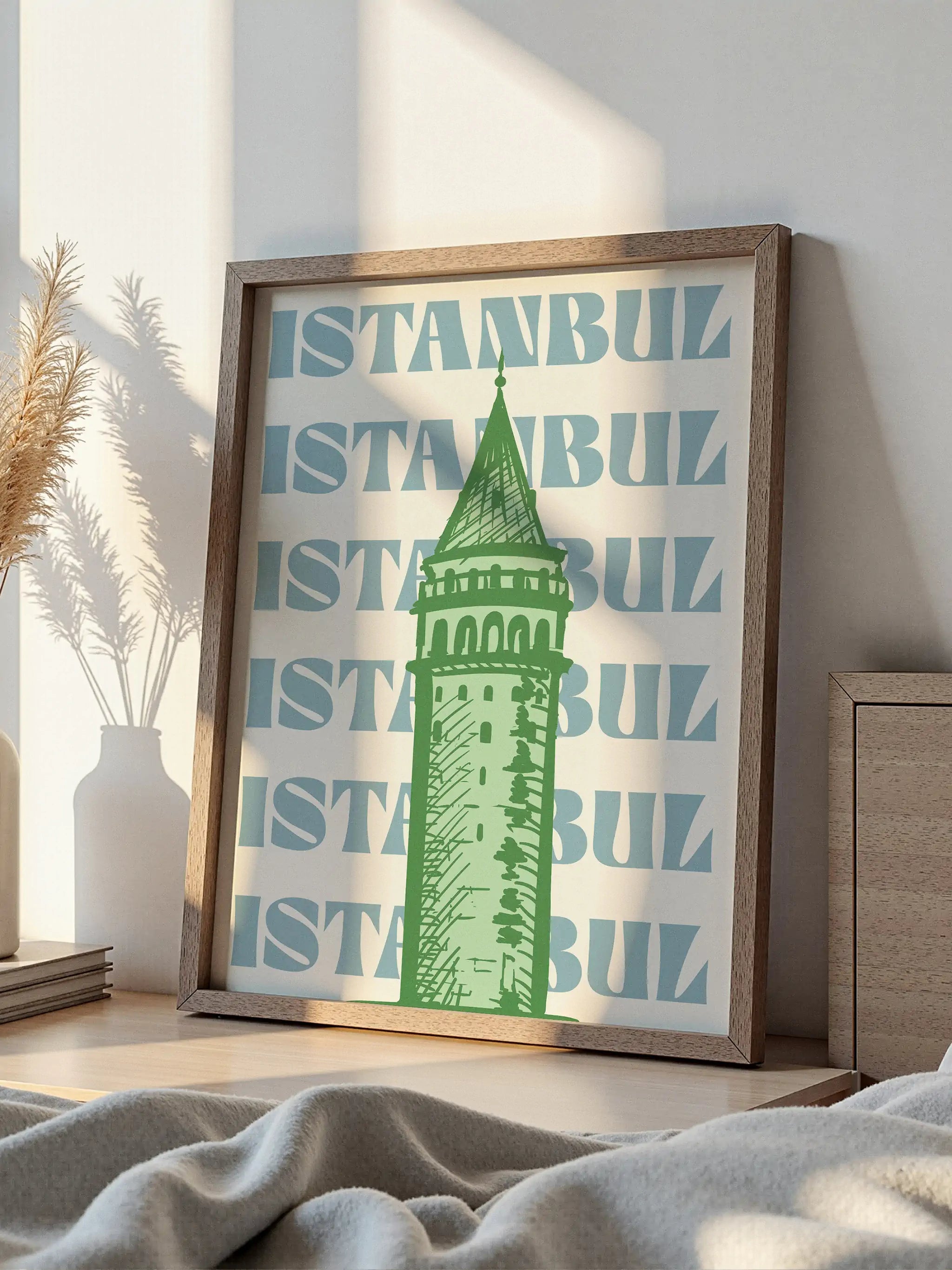 Green sketch-style Galata Tower illustration with a repeating "Istanbul" background.